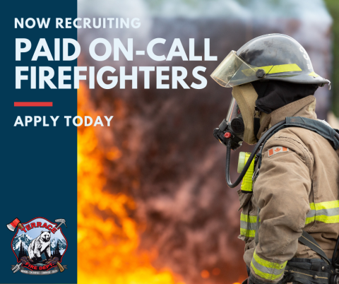 firefighter recruitment poster with dramatic shot of firefighter in front of flames